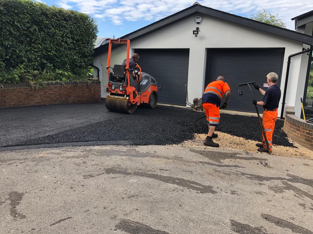 This is a photo of a bitumen driveway which is in the process of being installed by Craigieburn Road Tech