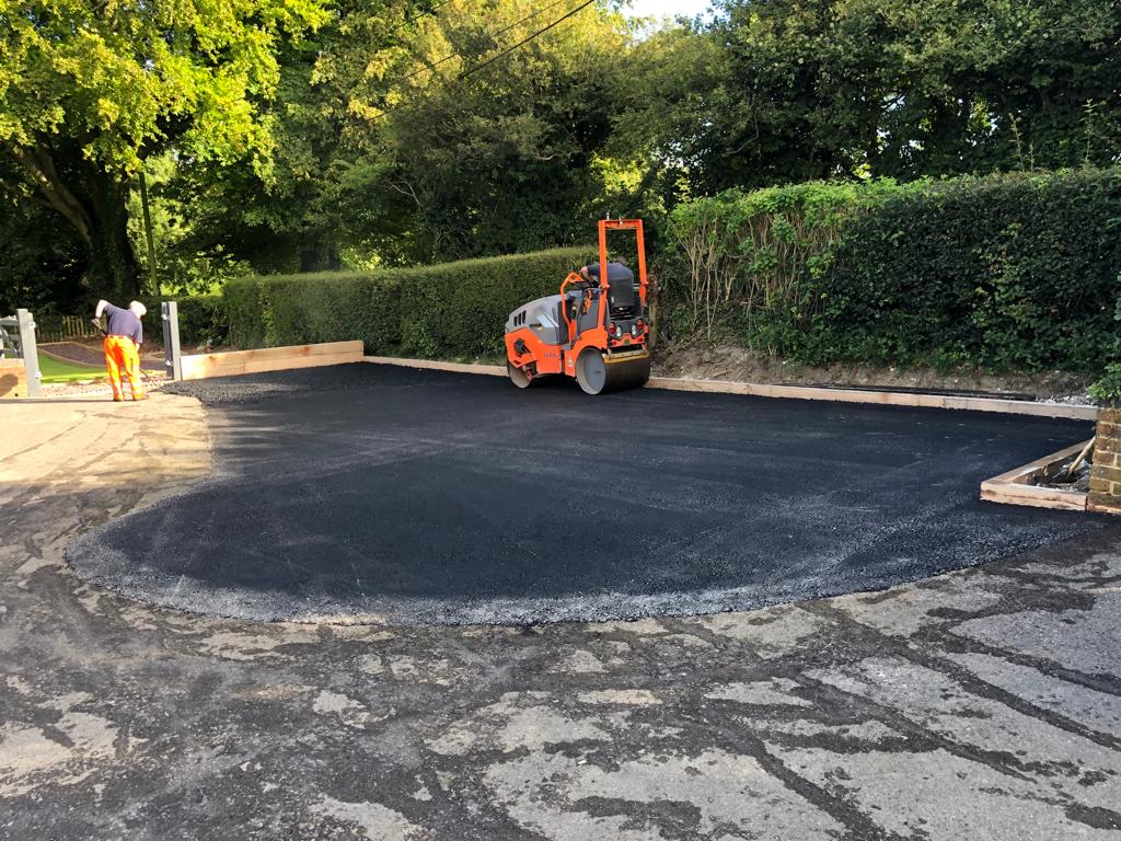 This is a photo of a bitumen driveway which is in the process of being installed by Craigieburn Road Tech
