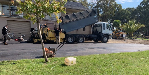 This is a photo of an asphalt driveway which is in the process of being installed by Craigieburn Road Tech